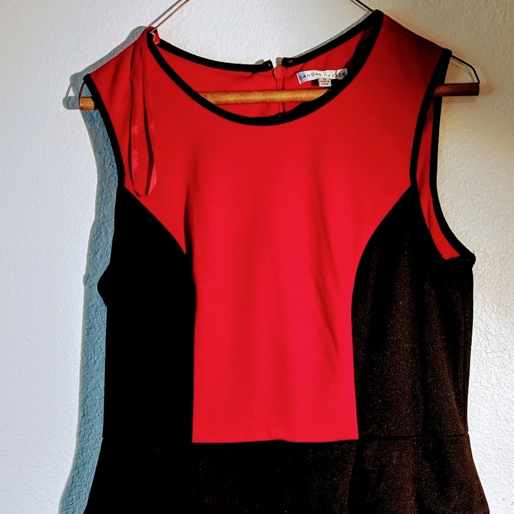 Sleeveless peplum dress